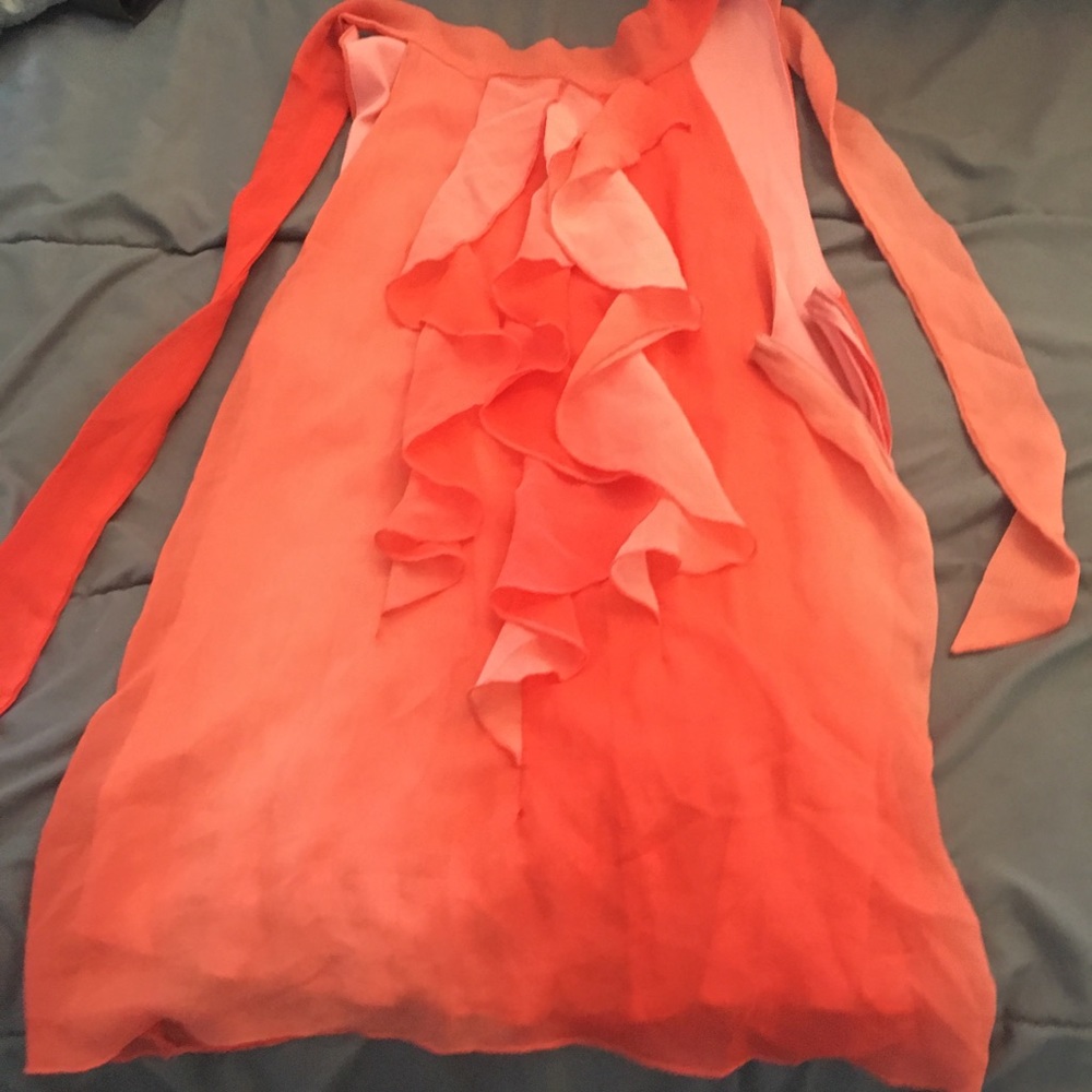 Orange ruffled halter top